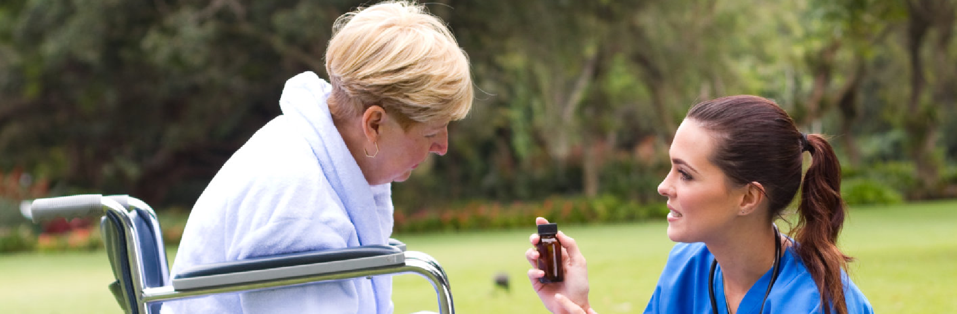 caregiver holding a medicine